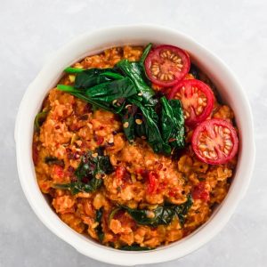 Savoury oats with jollof flavours in a bowl