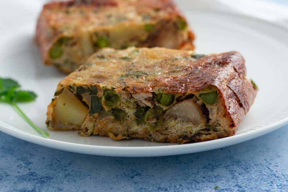 Tunisian chicken tagine slices on a plate