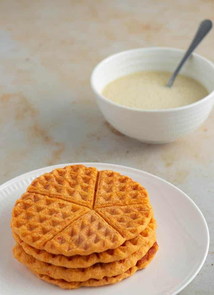 Akara prepared in a waffle maker served in a plate