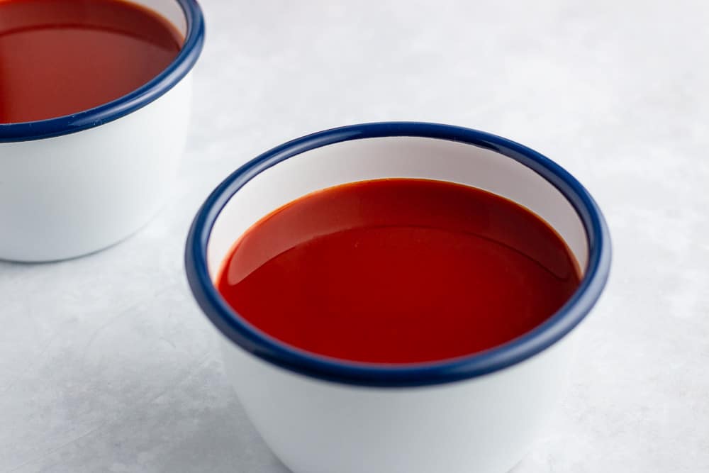 Red palm oil in a two bowls