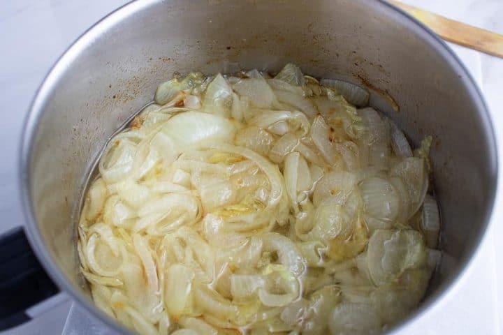 Fried onions in a pot. Ingredients for Ghana shito