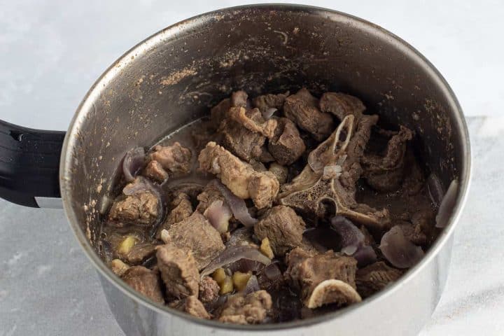 Cooked goat meat in a pot