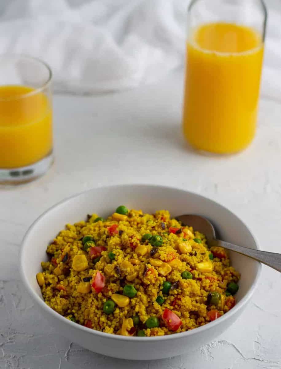 Curried couscous with sweet vegetables in a bowl