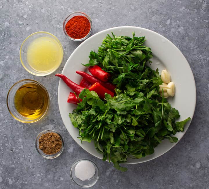 Red chermoula ingredients laid out on a tray