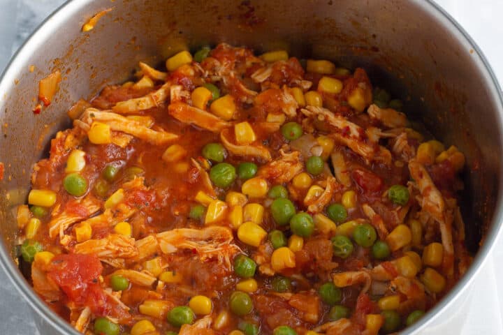 Peri peri shredded chicken with vegetables in a pot