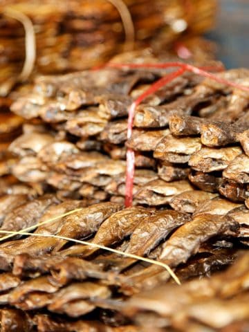 Dried fish displayed in the market. Adobe Photos