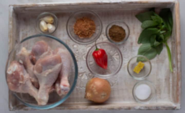 Nigerian Chicken pepper soup ingredients on a tray