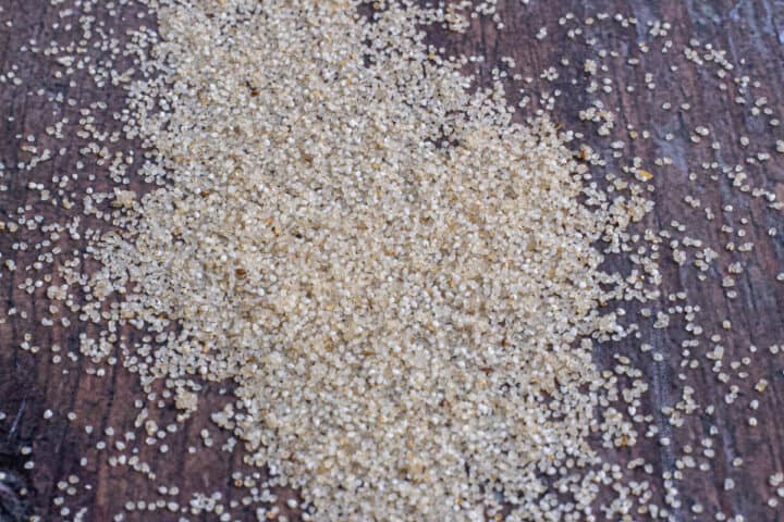 Fonio grains on a brown background