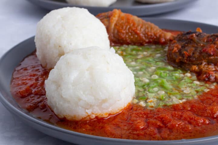 Tuwo shinkafa served with okra and obe ata