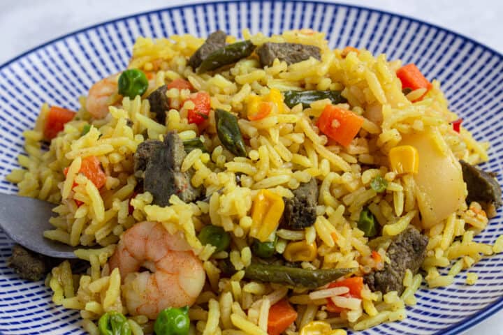Nigerian fried rice with mixed seafood