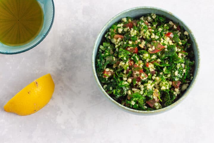 Tabbouli | Tabbouleh - Lebanese Parsely Salad in a green bowl