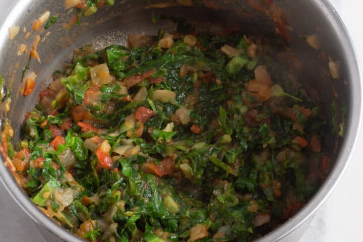 Sukuma wiki, cooking in a pot